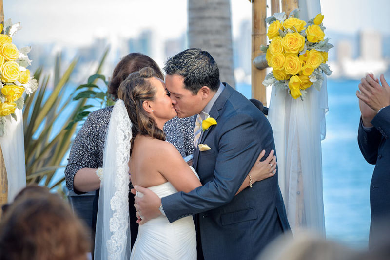 You may kiss the bride in front of the ocean ceremony