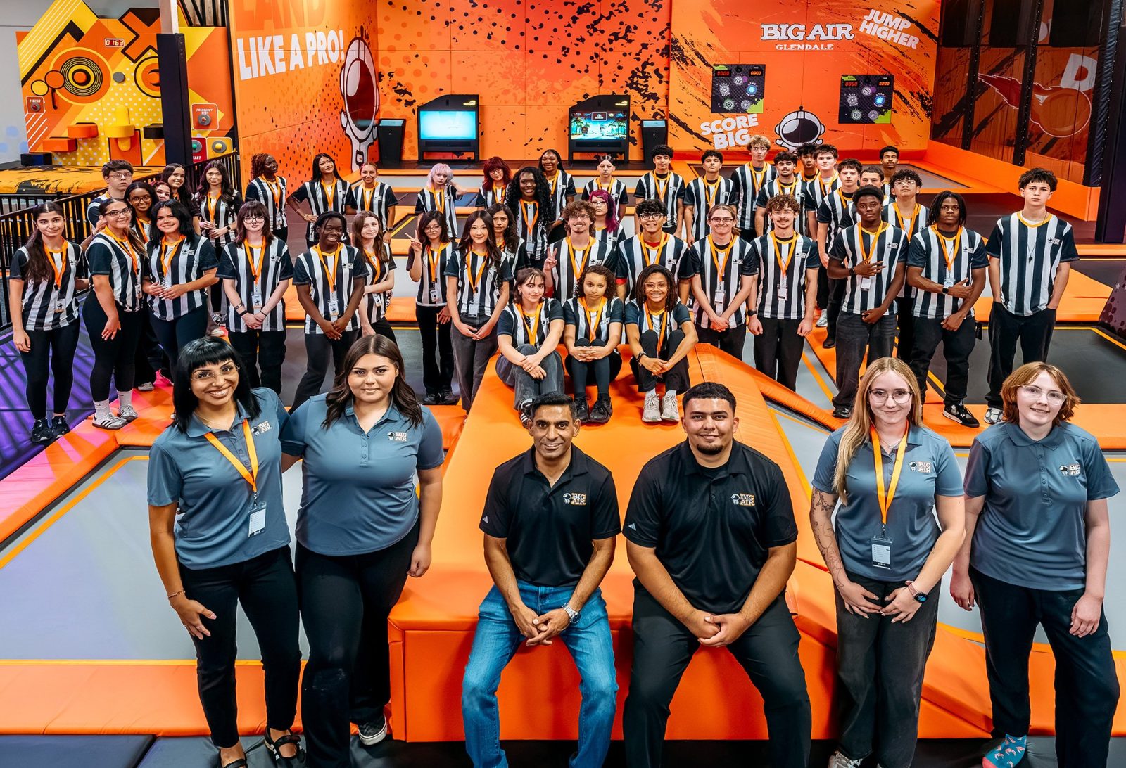 Big Air Glendale staff team photo on the trampoline courts at the new Glendale AZ adventure park