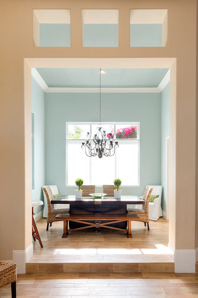 Captivating and contemporary dining room featuring a fusion of artistry and modern design