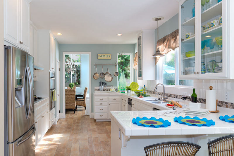 Well-lit modern kitchen with a serene oceanic and seaside color palette