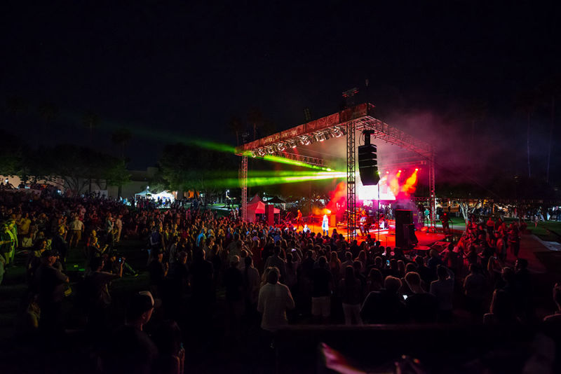 Crazy light parade of a stage during a nighttime concert