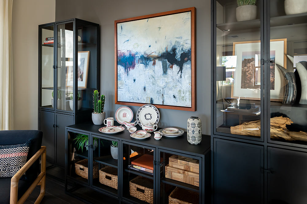 Exquisite display of HF Coors ceramics showcased in a beautifully designed home cabinet