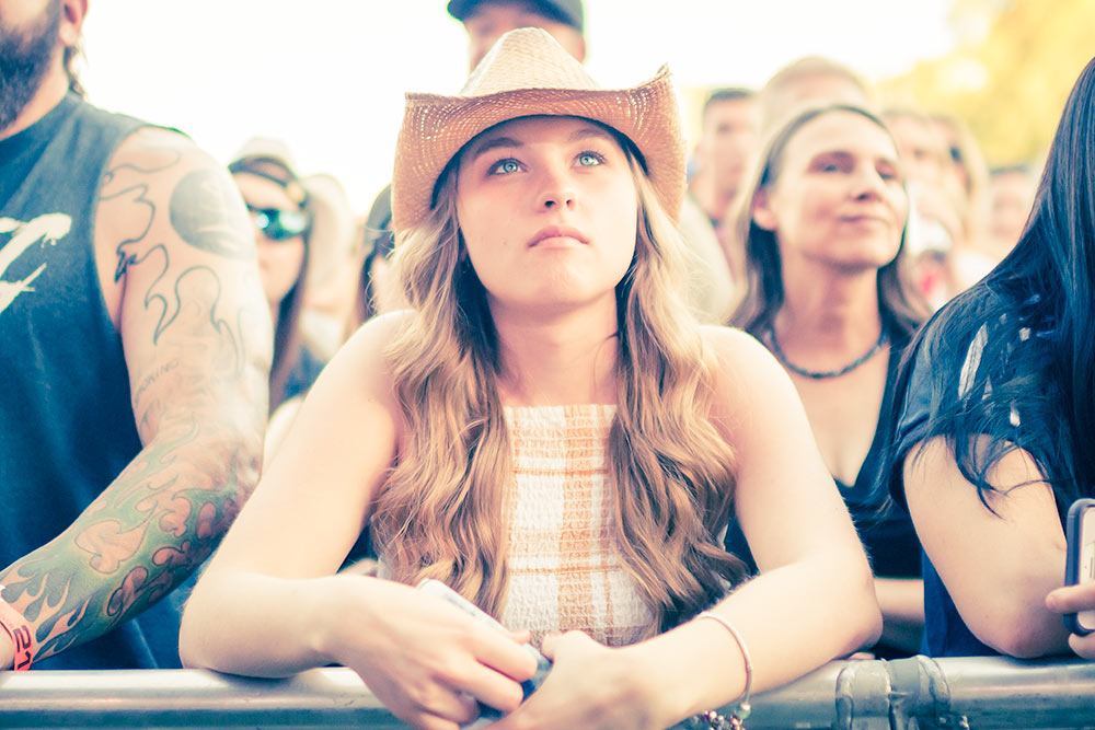 Fans of Easton Corbin watch as the band plays on