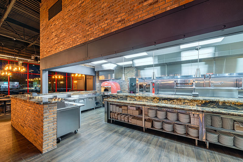 Cool vs. warm tones of this kitchen area at the Taphouse