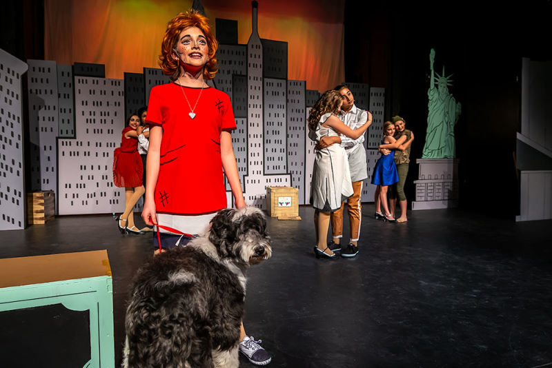 Annie with her dog during a live performance