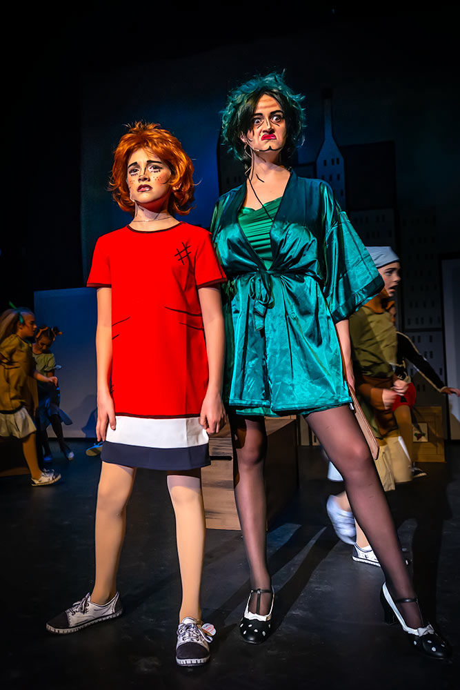 Annie and Miss Hannigan duel it out
