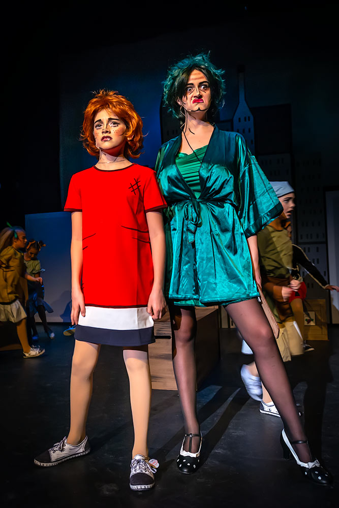 Annie and Miss Hannigan duel it out