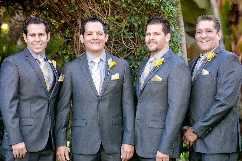 Groom and company posing