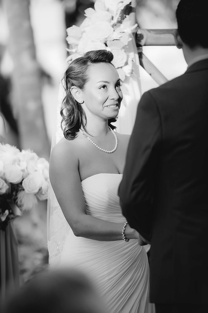 A bride saying I do during a wedding ceremony