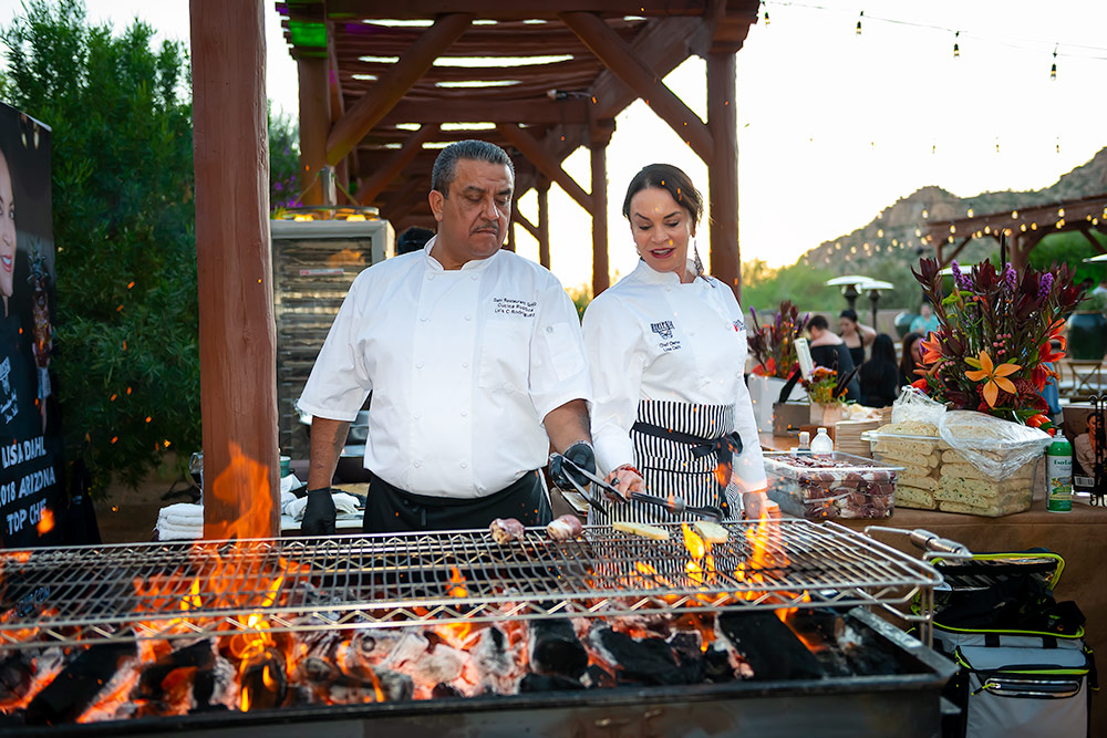 2 fine chefs at a bbq