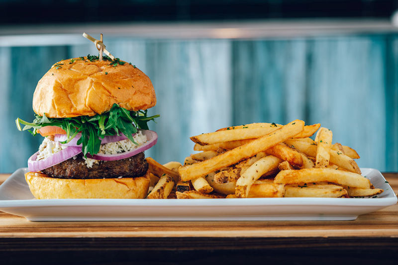 Yummy burger with zesty fries