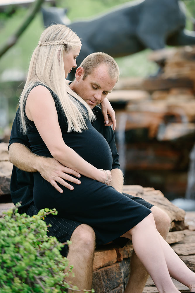Love-filled moment as couple anticipates their new arrival