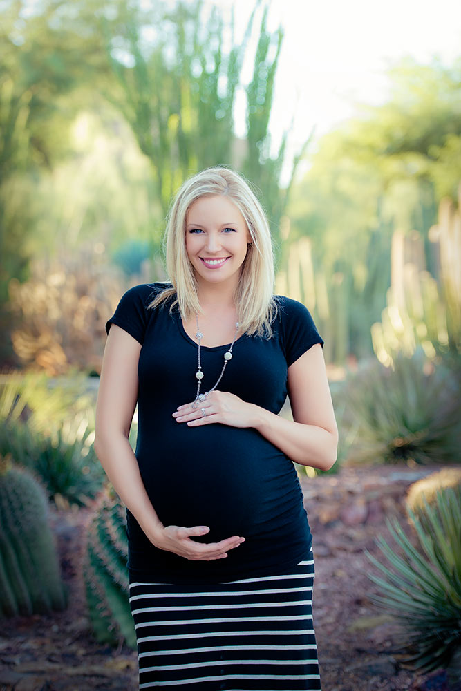 Beautiful expectant mother in a stylish outfit