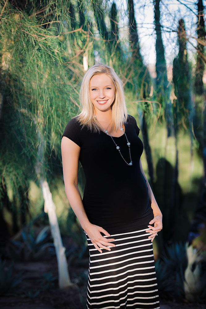 Pregnancy fashion: vibrant blue top and striped skirt