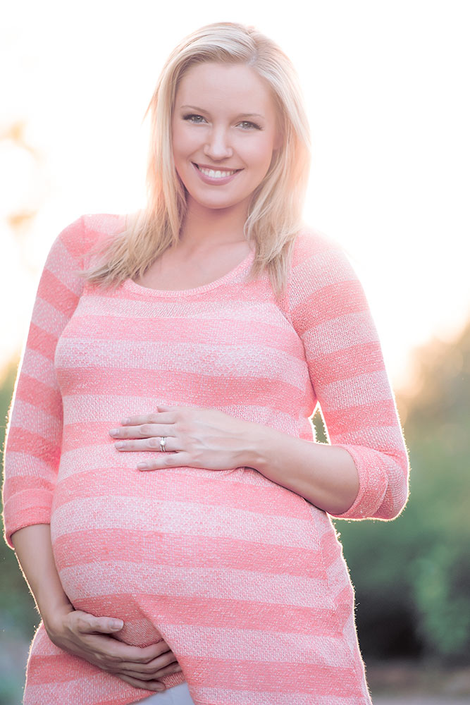 Fashionable maternity style in desert scenery