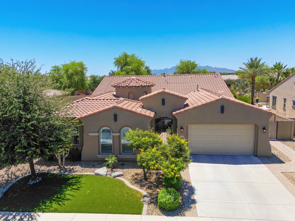 Low aerial of a single family home and front yard in the Phoenix area — photo 1