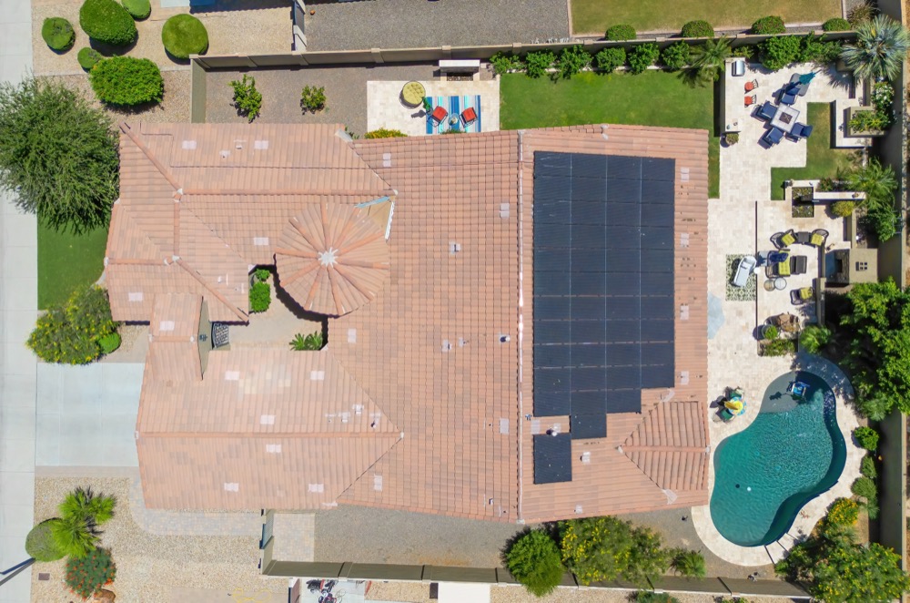Top down drone view of a home roof, solar panels and pool in the Phoenix area — photo 2