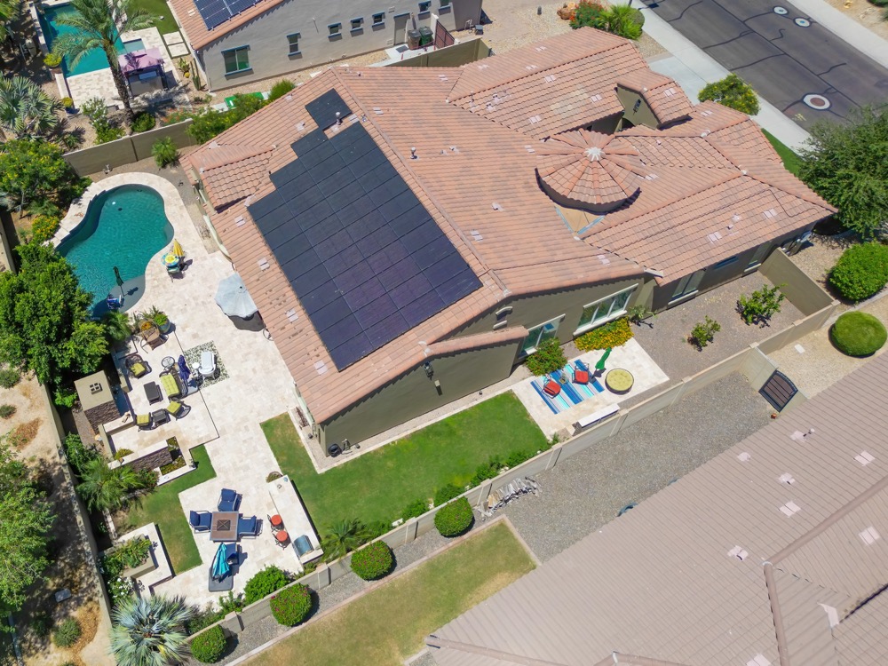 Aerial of a home with solar panels, backyard and pool in the Phoenix area — photo 3