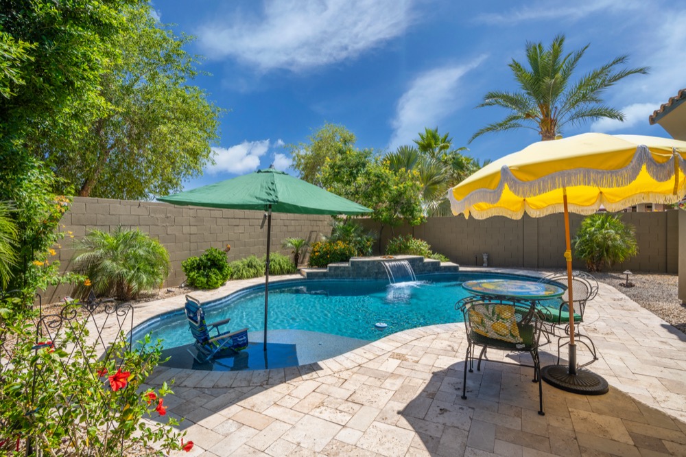 Backyard pool and patio of a single family home in the Phoenix area — photo 7