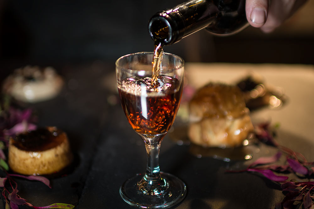 Pouring a cocktail during an event