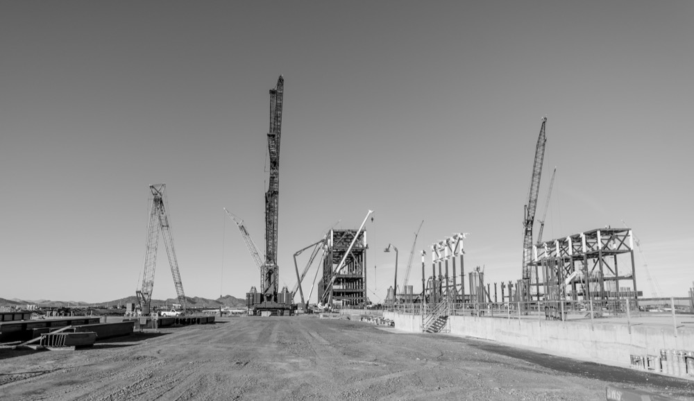 Black and white view of cranes across the TSMC Arizona construction site in Phoenix — photo 4