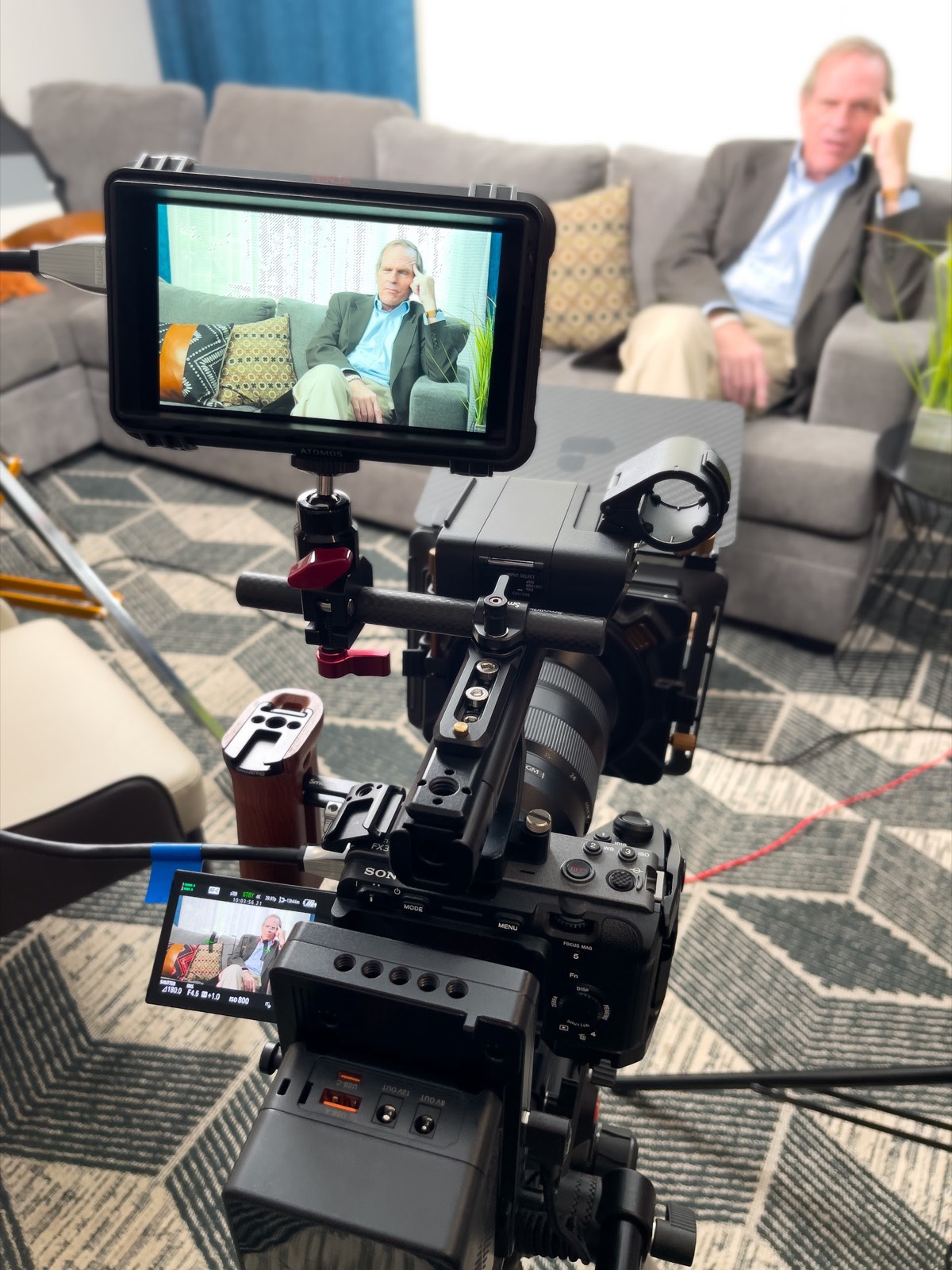 On-location interview setup with monitor and Sony FX cinema camera