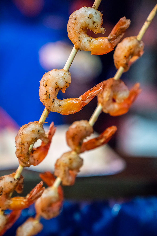 Shrimp skewer over a BBQ